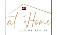 Logo de INMOBILIARIA AT HOME LUXURY REALTY
